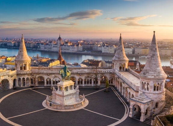 budapest-hungary-fishermans-bastion-statue-king-stephen-i-parliament-of-hungary_1284286561_web Budapest, Hungary - The famous Fisherman's Bastion at sunrise with statue of King Stephen I and Parliament of Hungary at background