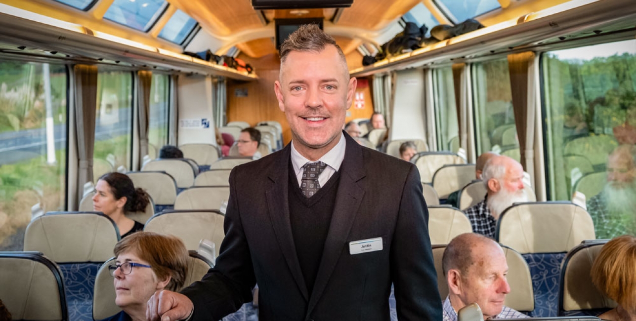 Host in Scenic Class onboard the Tranz Alpine train in New Zealand