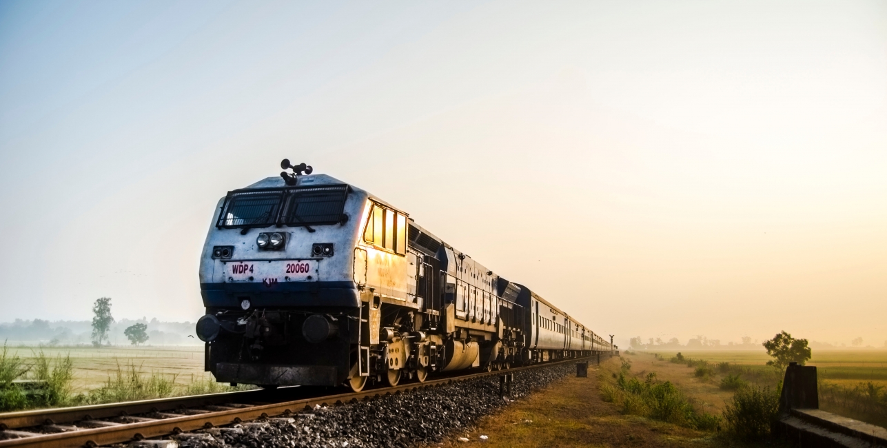 Indian Railways A train travels through paddy fields