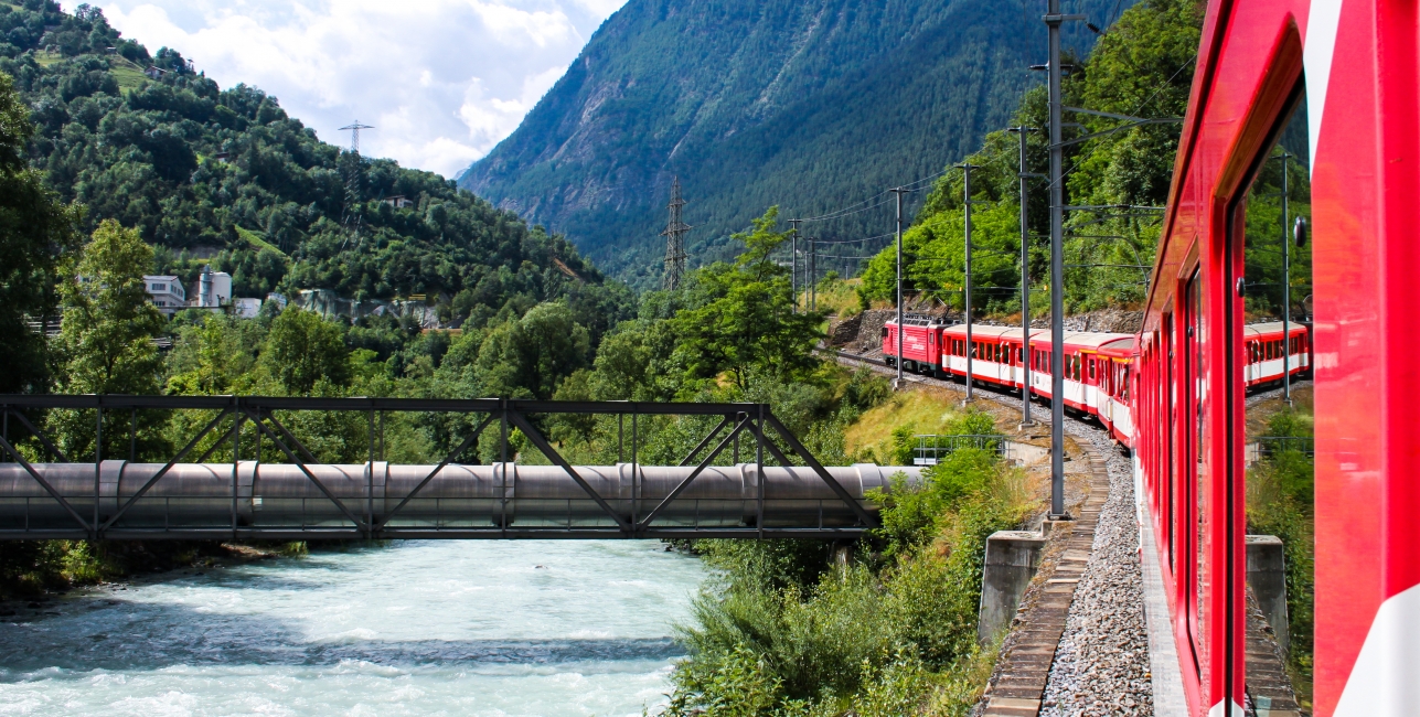 Gotthard Express Looking out from a train passing a river
