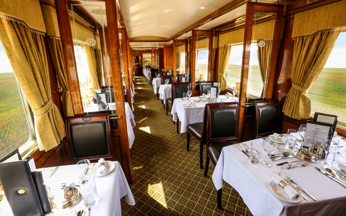 The Blue Train Dining Car A train carriage laid out with dining tables and chairs