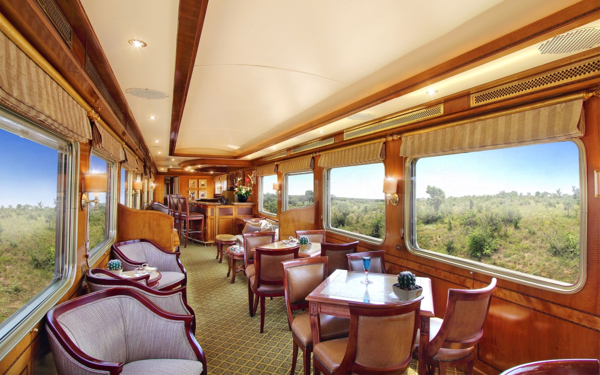 The Blue Train Lounge Car Insidea train carriage, with comfortable chairs and tables