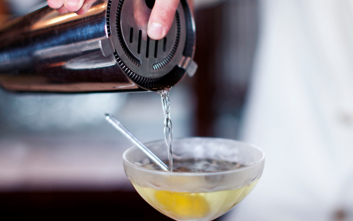 cocktail being poured onboard the famous VSOE cocktail being poured onboard the famous Venice Simplon-Orient-Express train
