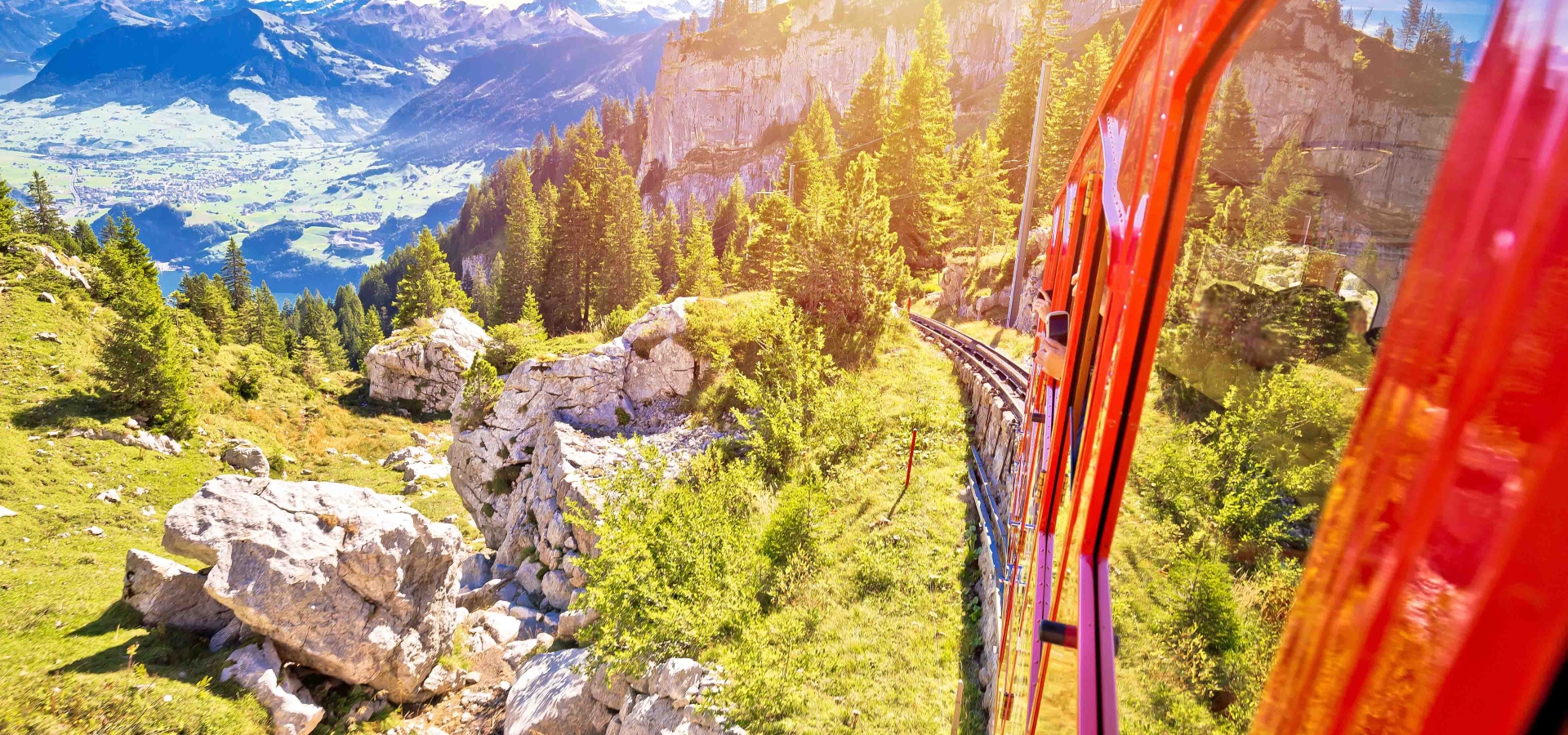 Mount Pilatus train descends the mountain on a sunny day