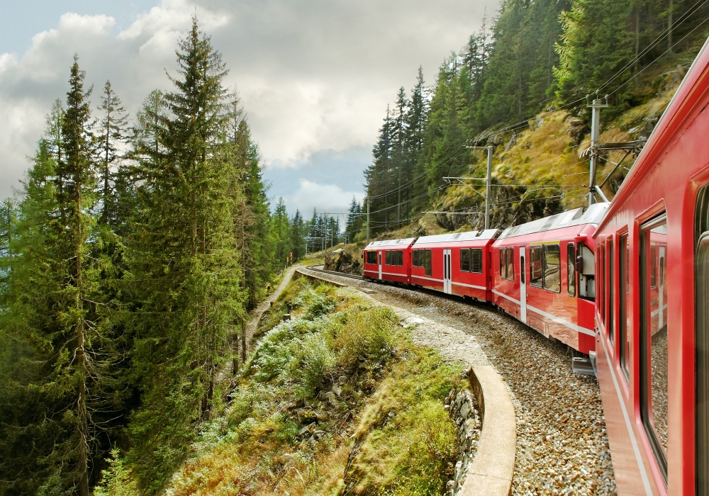 Bernina Express train traveling through mountains