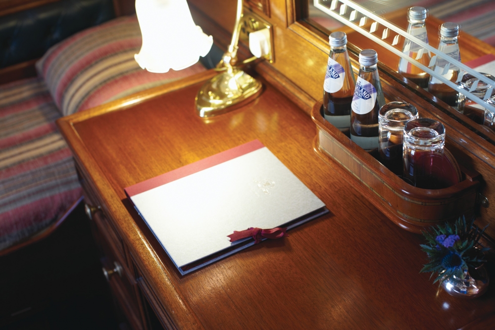 stationary in a cabin onboard the Belmond Royal Scotsman
