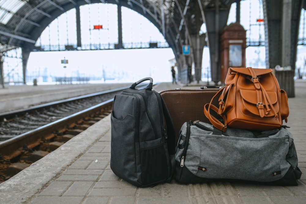 bags at railway station near railroad