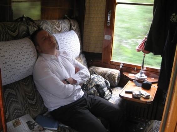 rail expert exhausted from his fun adventures on the train