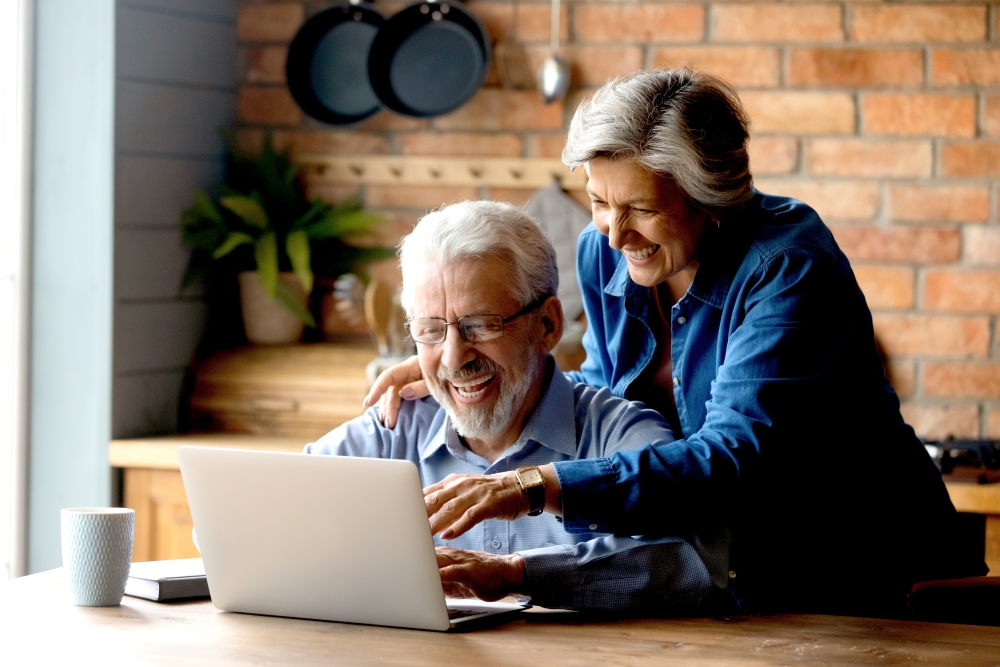 happy couple watching railbookers webinars